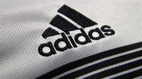 marca adidas origen